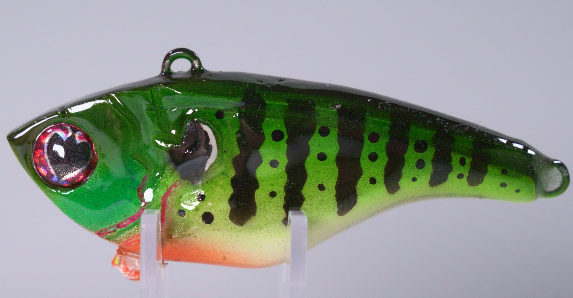 ½ oz Beetle Juice Gill Lipless Crankbait

Turn heads and trigger strikes with the Beetle Juice Gill Lipless Crankbait — a ½ oz lure that blends natural realism with bold flash. The Beetle Juice Gill pattern combines lifelike bluegill tones with a vibrant shimmer that stands out in both clear and stained water, perfectly mimicking the forage bass love to ambush.

This lipless crankbait delivers a tight, high-frequency vibration and rattling sound that calls in fish from a distance. Built for long casts 